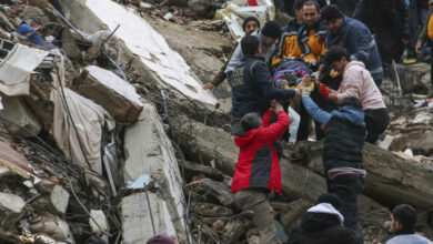 Via NPR/ image description by NPR: People and emergency teams rescue a person on a stretcher from a collapsed building in Adana, Turkey, Monday, Feb. 6, 2023. A powerful quake has knocked down multiple buildings in southeast Turkey and Syria and many casualties are feared. (IHA agency via AP)