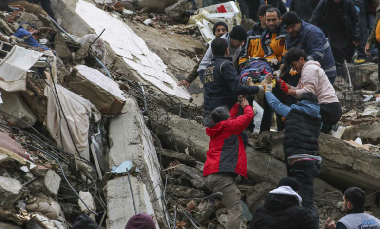 Via NPR/ image description by NPR: People and emergency teams rescue a person on a stretcher from a collapsed building in Adana, Turkey, Monday, Feb. 6, 2023. A powerful quake has knocked down multiple buildings in southeast Turkey and Syria and many casualties are feared. (IHA agency via AP)